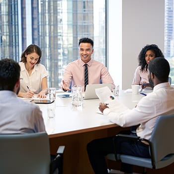 Business staff at meeting